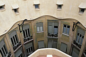View on the facade of inner courtyard from the rooftop, La Pedrera (Milà House 1906-1912, by Gaudí). Barcelona. Spain