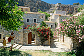 Woman and small girl visiting the medievel town Monemvasia, Peloponnes, Greece
