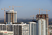 High rise building site and cranes at downtown, Miami, Florida, USA