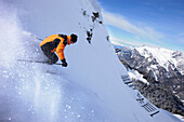 Skier in deep snow, skiing region Sonnenkopf, Vorarlberg, Austria