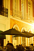 People at the terrace of Cafe Puerto Rico at night, San Juan, Puerto Rico, Carribean, America