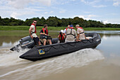 ZDF television film crew during MS Europa Zodiac Expedition on sidearm of the Amazon River, Boca da Valeria, Amazonas, Brazil, South America