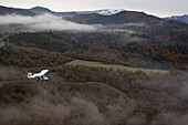 Aerial view of ULM plane above the mountains, South France, Europe