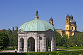 Pavillion of the Hofgarten, the onionshaped towers of the Frauenkirche and the Theatinerkirche in the background, Munich, Bavaria, Germany