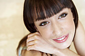 headshot of18 year old girl smiling into camera