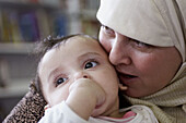 Headshot of arabic mother and child