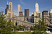 Illinois. Chicago. Trellis over Great Lawn at Pritzker Pavilion in Millennium Park, designed by Frank Gehry, modern architecture, Cloud Gate sculpture, the Bean