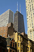 ILLINOIS Chicago John Hancock Center building, highrise buildings and brownstones, top portion of each building, various architectural styles