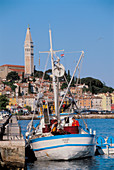 Rovinj, city skyline and harbor, fishingboat. Istria region, Croatia.