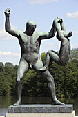 Gustav Vigeland s statues of man and girl at Frogner Park, Oslo. Norway