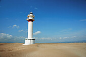 Lighthouse at Punta del Fangar, Ebro River delta Natural Park. Tarragona province, Catalonia, Spain