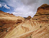 Storm approaching The Wave , swirling sandstone formation. Paria Canyon-Vermilion Cliffs Wilderness. Arizona. USA