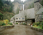 Multnomah Falls lodge with Multnomah Falls at background. Columbia River Gorge National Scenic Area. Oregon. USA