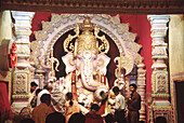 Decorated idol of Lord Ganesh at the Ganesh Festival. Pune, India