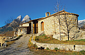 Romanesque church of Sant Ponç de Molers (XI-XII) with Pedraforca massif at background. Molers village. Cadí-moixero Natural Park. Sierra del Cadí. Berguedá region. Barcelona Province. Spain