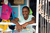 Saleswoman in a souvenir shop at North Point, Barbados, Caribbean