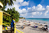 Lifequard observing Accra Beach, Rockley, Barbados, Caribbean
