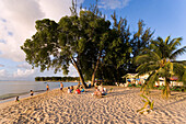 People relaxing at beach, Speightstown, Barbados, Caribbean