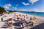 People relaxing at beach, Bridgetown, Barbados, Caribbean