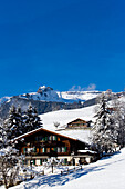 Snow covered alpine house, Grindelwald, Bernese Oberland, Canton of Bern, Switzerland