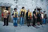 People holding icons at a procession, Orthodox icon procession, Agros, Troodos mountains, South Cyprus, Cyprus