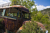 Wreck of a bus, derelict bus, Potamitissa, Pitsilia region, Troodos mountains, South Cyprus, Cyprus