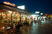 Restaurant, cafe along the harbour promenade at night, Paphos, South Cyprus, Cyprus