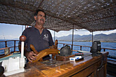 Skipper, captain at the wheel, Neptun pirat boat trip, Kaleidoskop Turizm, Kyrenia, Girne, North Coast, Cyprus