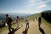 People hiking on Brauneck, Lenggries, Upper Bavaria, Bavaria, Germany