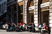 People sitting in a pavement cafe, Gerbergasse, Basel, Switzerland