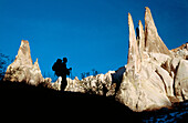 Mountain climber at Meskendir valley. Goreme. Cappadocia. Turkey