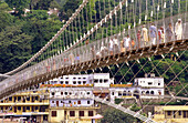 Ramjhula bridge over Ganges river. Rishikesh. Uttar Pradesh. India.