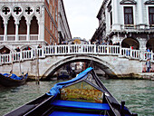 Gondola and Sighs Bridge in background. Venice. Italy