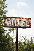 A rusty sign outside an abandoned motel , Ontario, Canada.