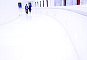 Two women at the end of white walkway, British Museum. London. England