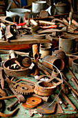 Old rusty cogs, wheels, and tools. Lurcy-Levis. France