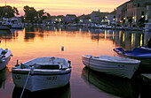 Sunrise over Stari Grad harbor with fishing boats. Hvar Island, Dalmatia. Croatia