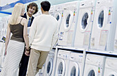 Couple buying a washing machine