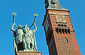 Lur blower statue and City Hall tower. Copenhagen. Denmark