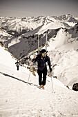 Couple backcountry skiing at Sonnblick range, Hohe Tauern National Park, Rauris, Salzburg (state), Austria