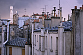 Paris apartments in the evening light, rooftops of Paris, romantic, Paris, France