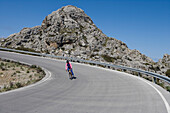Cyclist on Sa Calobra Mountain Road, Near Cala de Sa Calobra, Mallorca, Balearic Islands, Spain