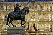 Felipe III statue at Plaza Mayor (Main square). Night view. Madrid. Spain.