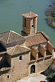 Overview of Miravet parish church and Ebre river. Tarragona province. Catalunya. Spain