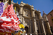 Folkloric dresses and Cathedral. Granada. Andalusia. Spain