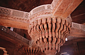 Carved stone column inside. Diwan-I-Khas, Hall of private audiences. Fatehpur Sikri. Uttar Pradesh. India