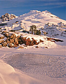 Mount Baker and frozen tarn. North Cascades. Washington. USA