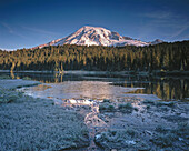 Morning light on Mount Rainier and Reflection Lake. Mount Rainier National Park. Washington. USA.