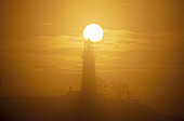Sunset. Yaquina Head lighthouse. Oregon coast. USA.