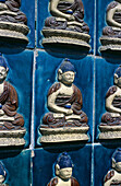Glazed tiles with Buddha, White Dagoba Temple, Beihai Park. Beijing. China.